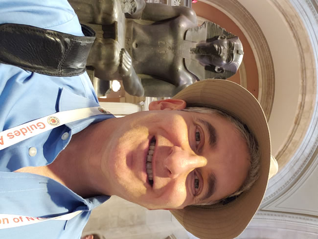 Jared in front of an Egyptian statue as his often used meeting point